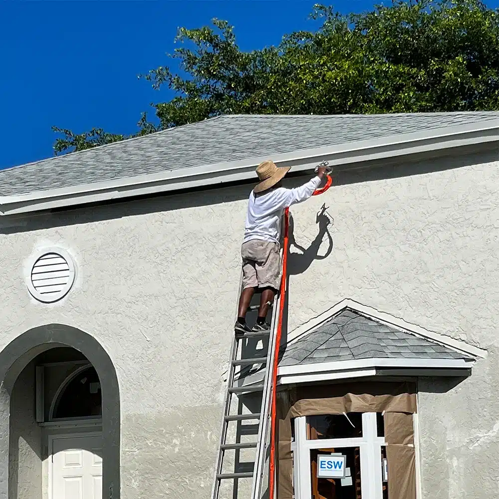 worker spray painting