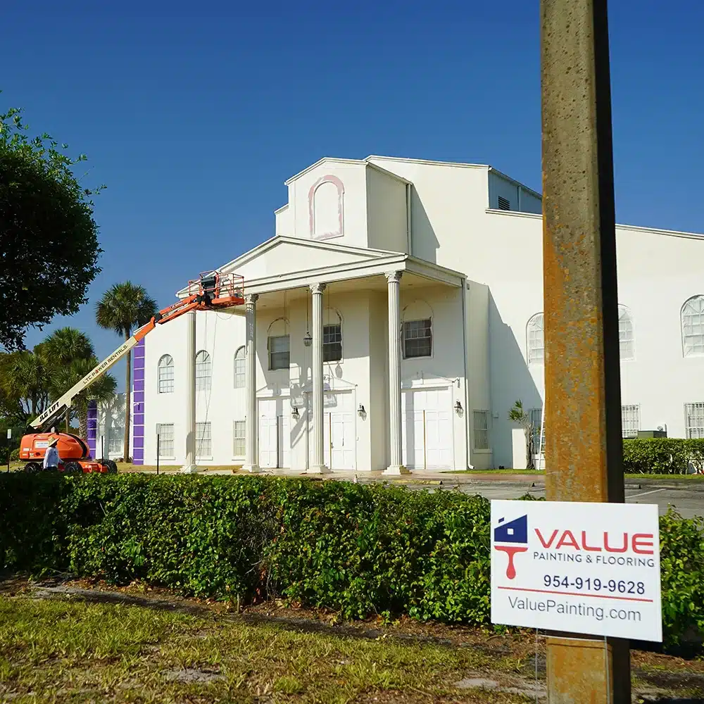 Commercial painting project in progress on exterior of church