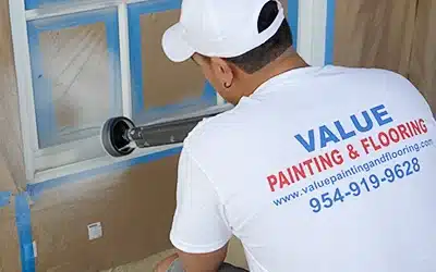 Value Painting and Flooring painter working on a cost-effective electrostatic paint job