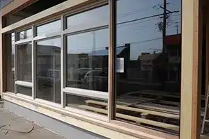 Commercial store window frame featuring electrostatic painting