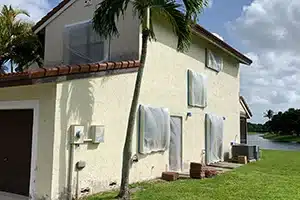 A house prepared for exterior painting.