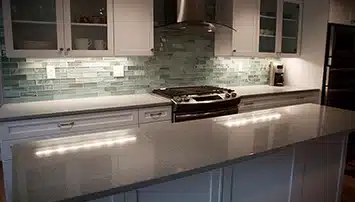 Glass tile backsplash in kitchen