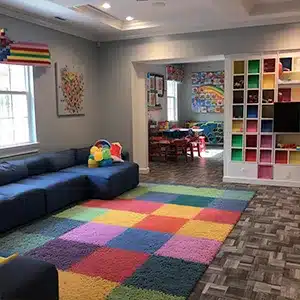 Vibrant nursery and playroom painted by Value Painting and Flooring