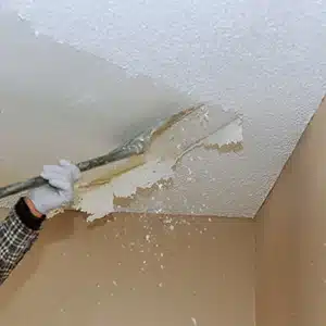 https://www.valuepaintingandflooring.com/wp-content/uploads/2023/05/scraping-off-popcorn-ceiling.webp