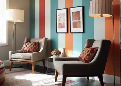 A wall painted with bold, decorative stripes.