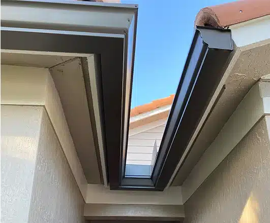 Home exterior with beautifully painted gutters