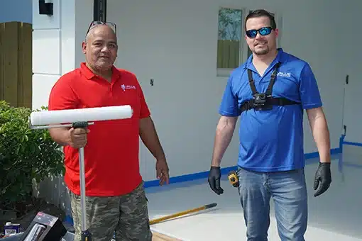 Value Painting & Flooring team preparing for a garage epoxy flooring project