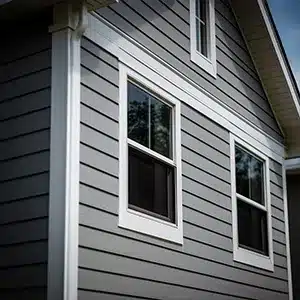 Vinyl siding exterior house painting by Value Painting and Flooring.