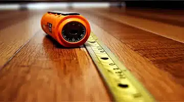 Image showcasing measuring tape for a laminate floor project