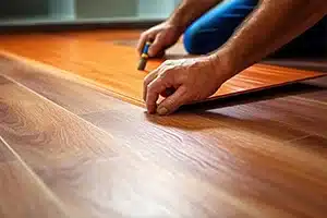 Image demonstrating the process of laying laminate floor.